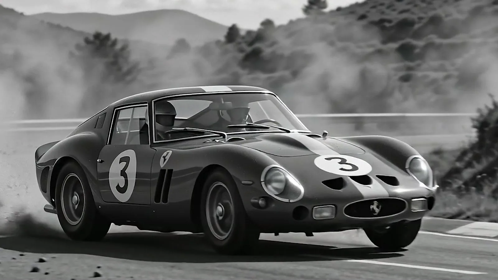 Black and white frame of the 250 GTO number 3 sliding through a corner, from the film