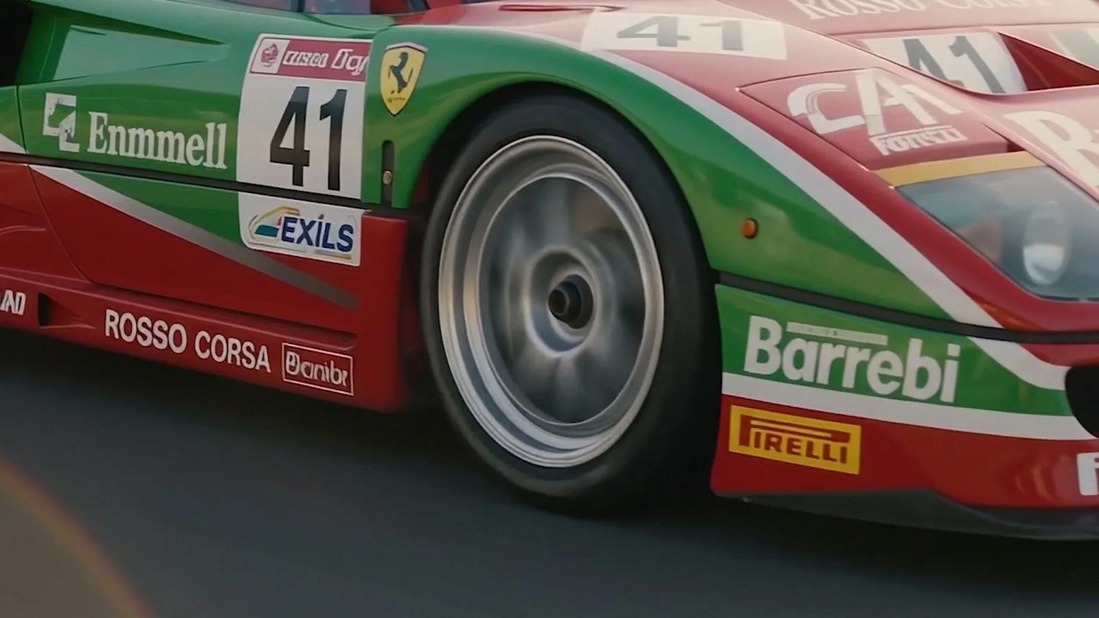 Frame from the film of the F40 GTE number 41 in its green, white and red livery at speed